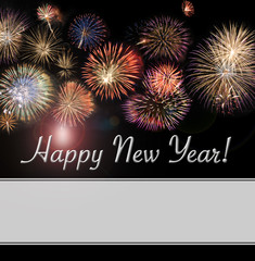 Happy New Year card and banner with beautiful flashy fireworks with plenty of area for additional white text for your message.