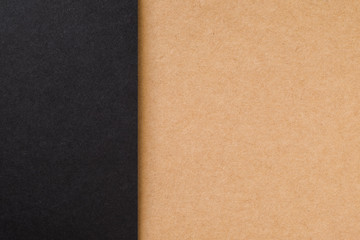 Fototapeta premium Kraft paper sheet overlap with brown and black colors for background, banner, presentation template.