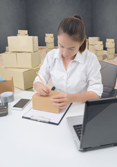 business owner woman working online shopping prepare product packaging process