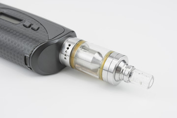 E - cigarette for vaping , technical devices.The liquid in the bottle   