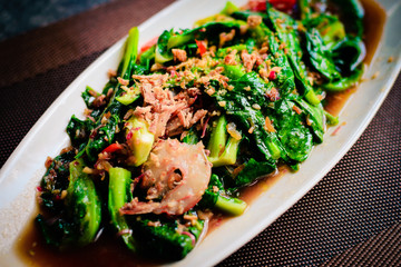 thai Stir-fried fresh baby kailan with prawn, garlic and oyster sauce.