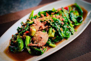 thai Stir-fried fresh baby kailan with prawn, garlic and oyster sauce.