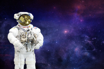 Fototapeta premium spaceman on space background.elements of this image furnished by NASA