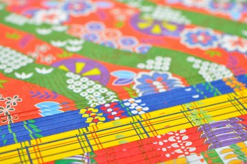 Naklejka premium 千代紙./色々な千代紙を重ねています.