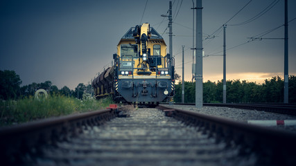 yellow train with dark sky