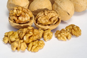 Walnuts on white background close up