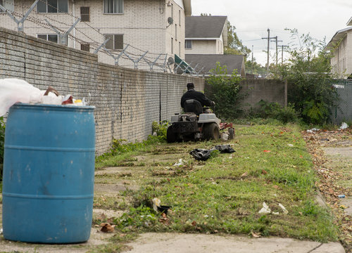 Landscaper Must Cut Grass In Neighborhoods With A High Crime Rate