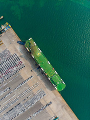Aerial view of sea freight, New Cars Produced Several times a year at industrial estate for import export around in the world