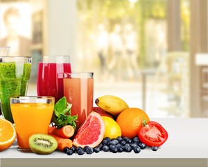 Composition of fruits and glasses of juice