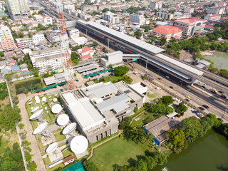 Bird's-eye view from drone of Satellite Dish, Satellite communication and satellite dish at Daytime...