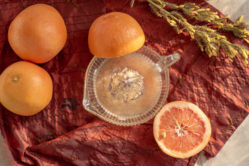 fresh squeezed grapefruit juice handmade in vintage glass juicer