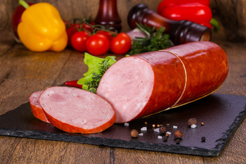 Pork sausages over wooden