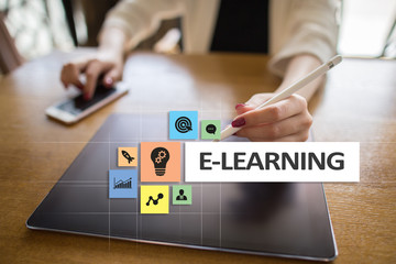 E-Learning on the virtual screen. Internet education concept.
