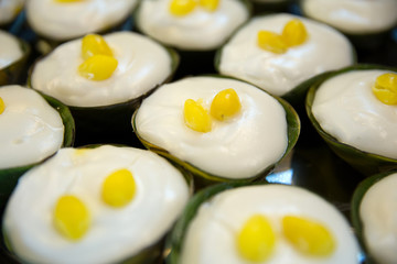 Making of Thai pudding with coconut topping as know as Ta-ko