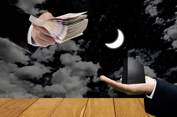 Shopping at night concept, Businessman carry cash for pay