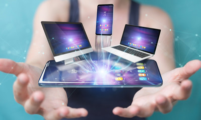 Modern devices connected in businesswoman hand 3D rendering