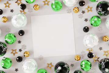 Christmas card mockup with green baubles 3D rendering