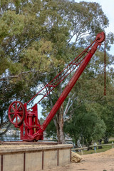 Fototapeta na wymiar Antique winch on the historic wharf at Morgan on the Murray River in South Australia.