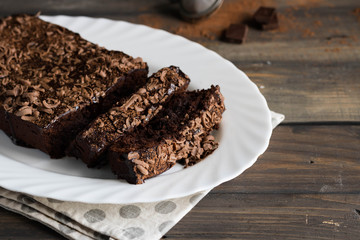 Chocolate pound cake with chocolate icing and chocolate chips