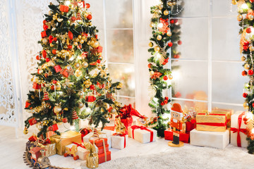 Living room home interior with decorated fireplace and christmas tree
