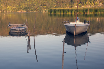 Fishing boat anchored near to the banks of the river.