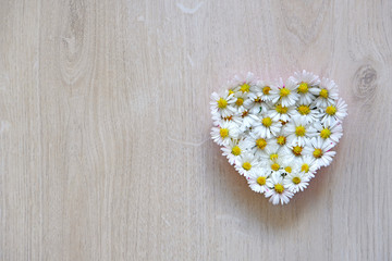 heart on wooden background, heart of flowers