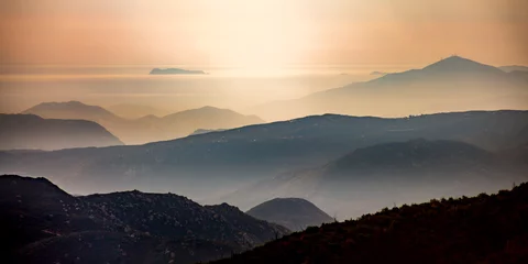 Fototapeten Silhouetted mountains and horizon at Mount Laguna © Jason