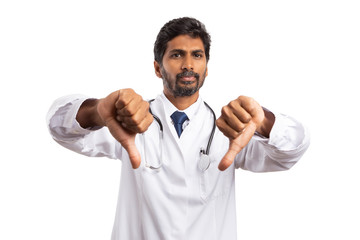 Male practitioner holding two thumbs down.