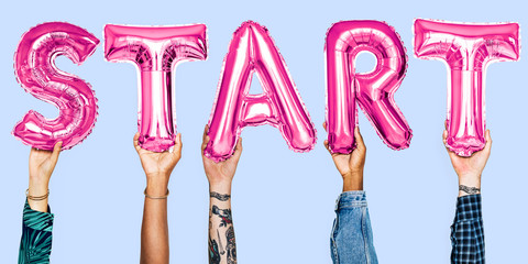 Hands holding start word balloon