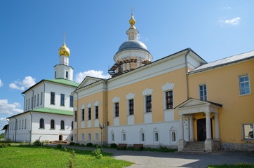 Fototapeta na wymiar Epiphany Old-Golutvin monastery in Kolomna, Russia. Cathedral of the Epiphany and Church of St. Sergius of Radonezh