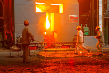 Technical staff check the quality of molten steel, in a iron and steel co., China
