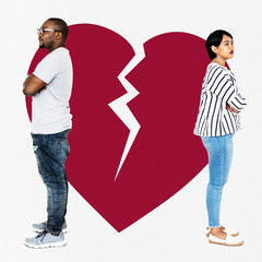Sad couple with broken hearts