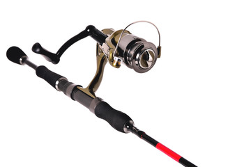 fishing reel on a fishing rod, white background close-up
