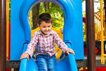Fototapeta na wymiar boy outdoors on the Playground