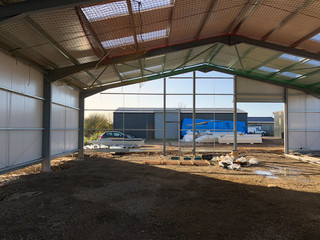 View from inside of a warehouse or factory. 