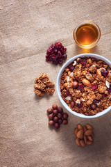 Oatmeal with berries and nuts. Honey. Nuts