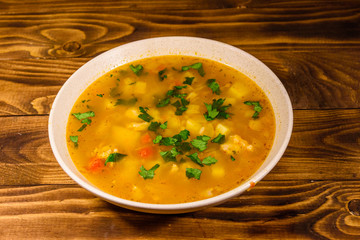 Georgian traditional food soup kharcho on wooden table