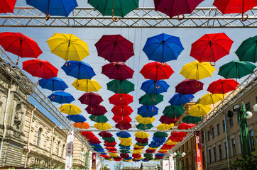 Fototapeta premium colored umbrellas blocked the alley