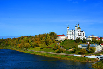 Fototapeta na wymiar Assumption Cathedral of the Assumption on the hill and the monastery of the Holy Spirit on the Western Dvina River. Vitebsk, Belarus