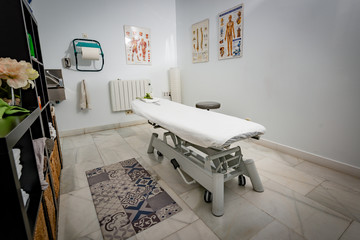 A physiotherapy cabinet at a Clinic, side standing view, ready to attend patients