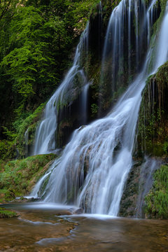 French landscape - Jura. Waterfall in the Jura mountains after heavy rain.