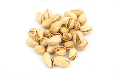 heap of pistachios isolated on white background