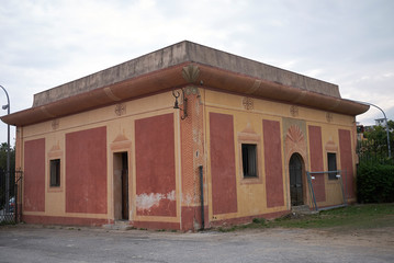 Fototapeta na wymiar Palermo, Italy - September 10, 2018 : Building at the entrance of Parco della Favorita