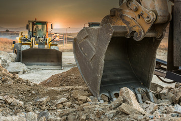 Detail of the shovel of an excavator on a building site