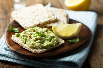 Avocado mash on rice bread