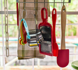 Kitchen tools hanging at window