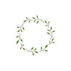 Wreath from green blades of grass branches and twigs. Garland good for greeting cards.