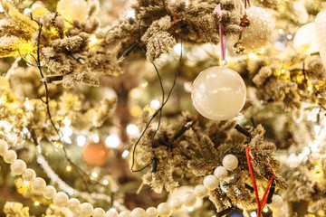 Decorated Christmas tree in rustic style. New Year scene. Close-up