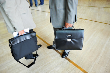 Two company executives attending a commercial event