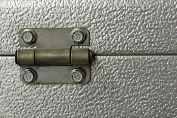 Close up of roller garage door hinge. Copy space.